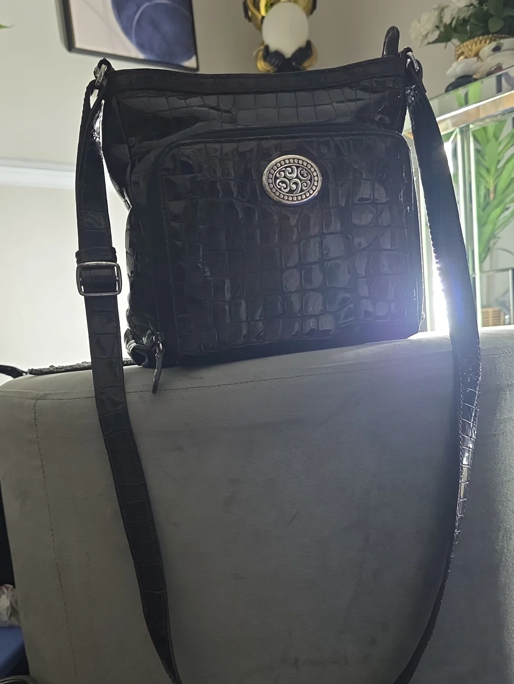 Brighton Black Croc-Embossed Messenger Bag with Silver Medallion